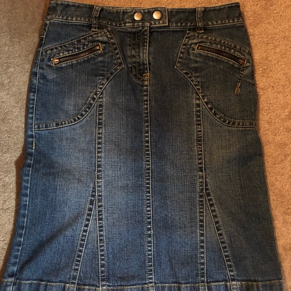 This is a denim skirt made by Ann Taylor LOFT and is a size 4.